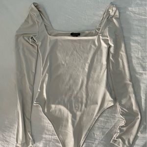 Beige/white long sleeve bodysuit